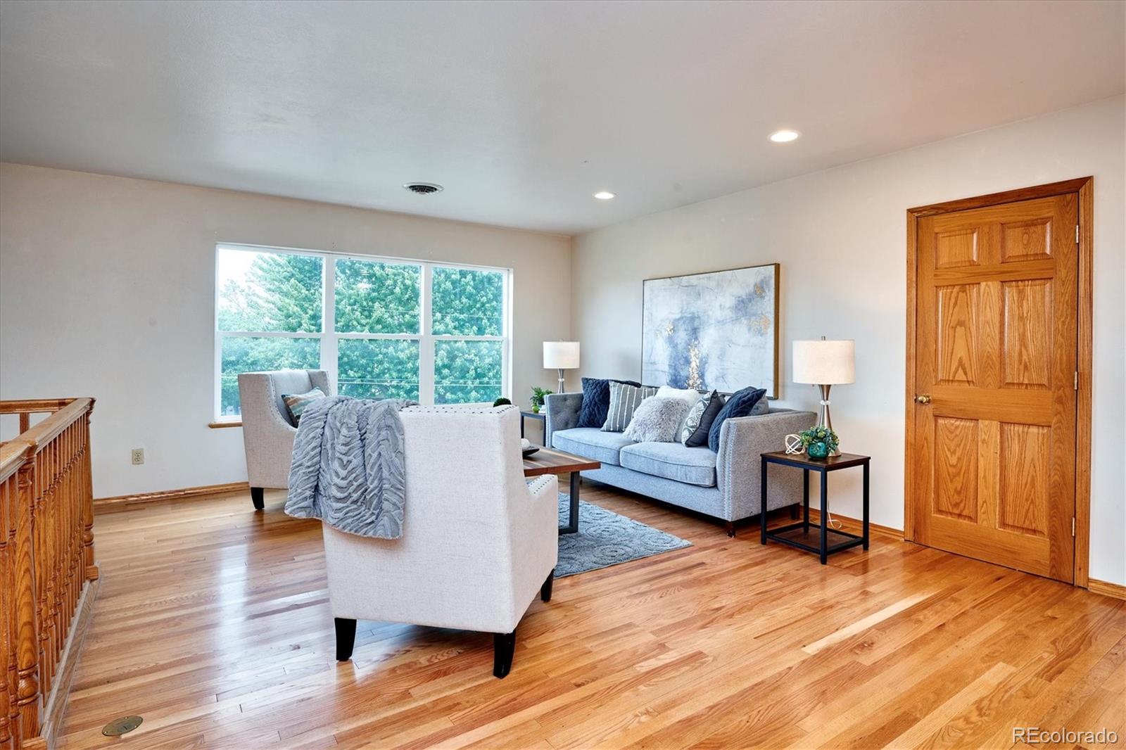 22 Rangeview Drive Wheat Ridge, CO 80215 - Photo 25 of 40 a living room with furniture and a window