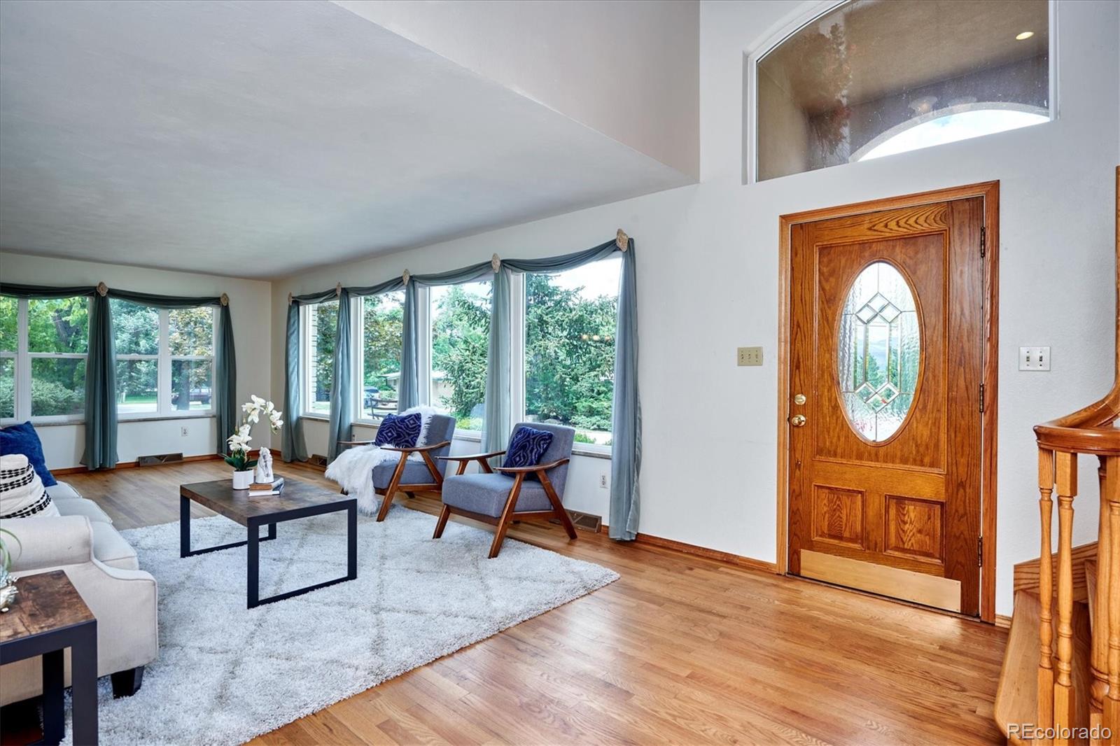 22 Rangeview Drive Wheat Ridge, CO 80215 - Photo 9 of 40 a living room with furniture and a window