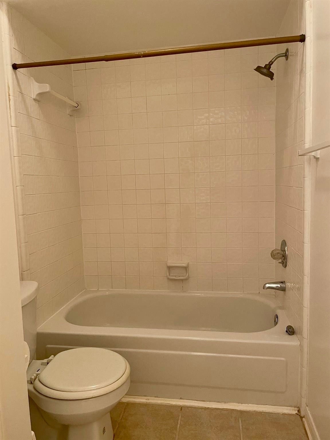 14527 Circlewood Way Houston, TX 77062 - Photo 14 of 14 a bathroom with a shower and a toilet