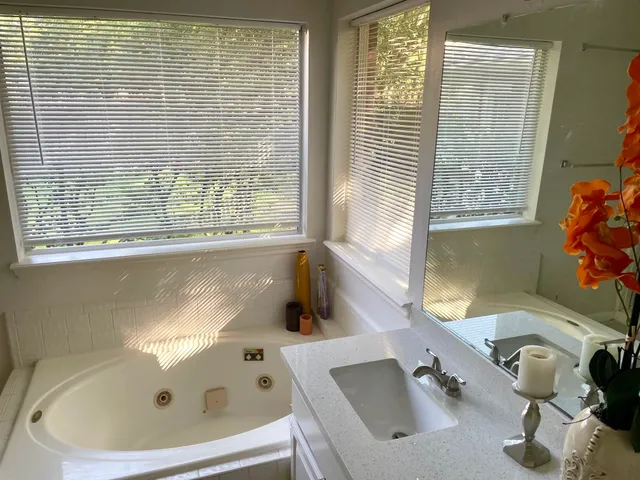 a bathroom with a sink and a tub