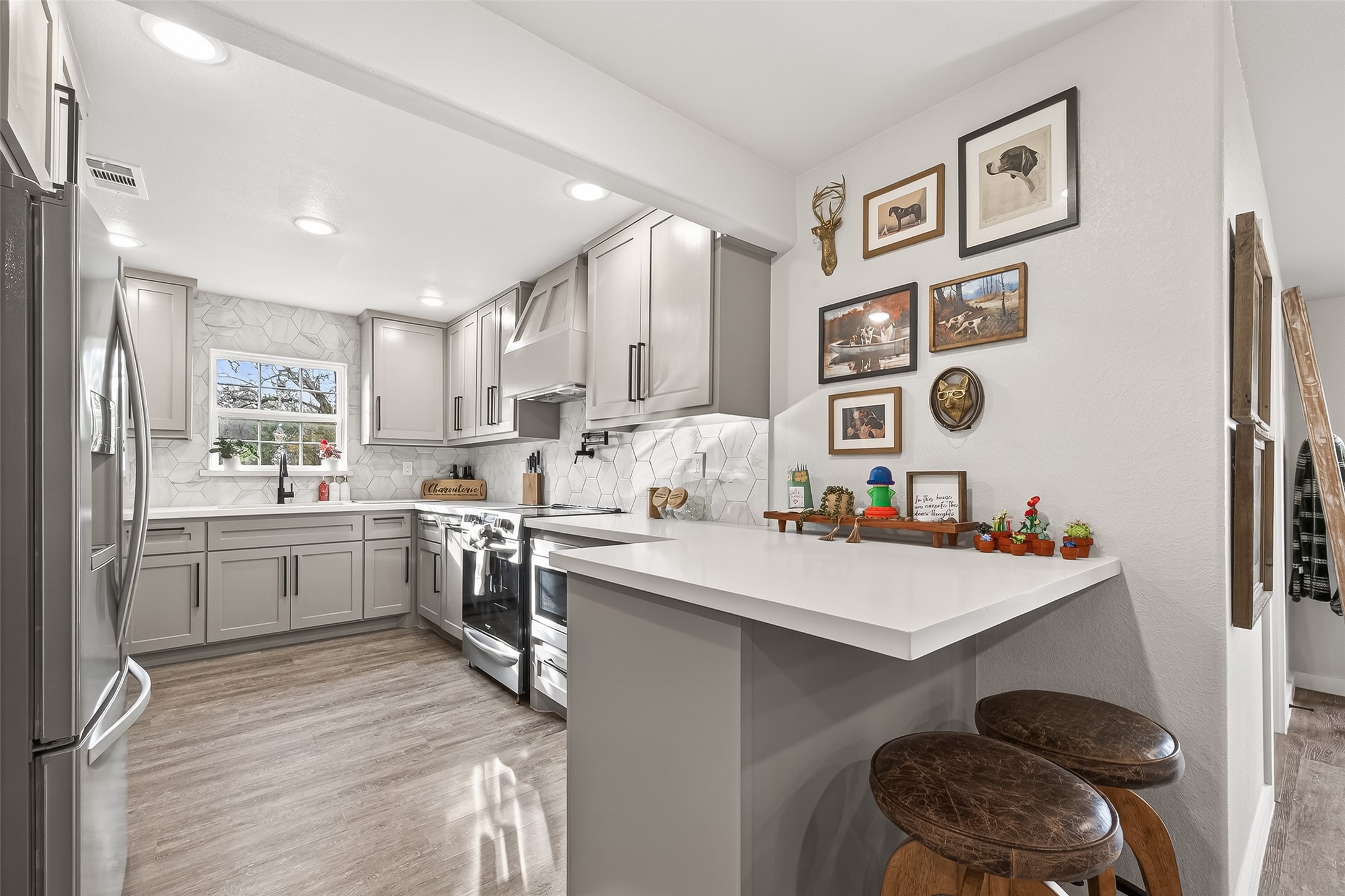 1047 Dungens Mill Road Columbus, TX 78934 - Photo 9 of 44 Convenient breakfast bar, brightly lit space, all completely remodeled!