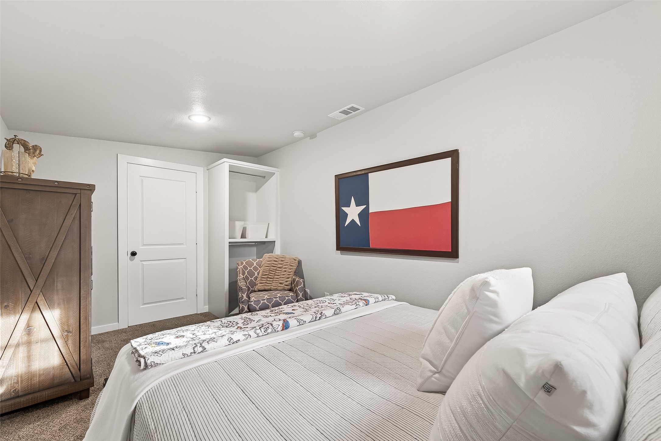 1047 Dungens Mill Road Columbus, TX 78934 - Photo 19 of 44 a bedroom with a bed and a couch