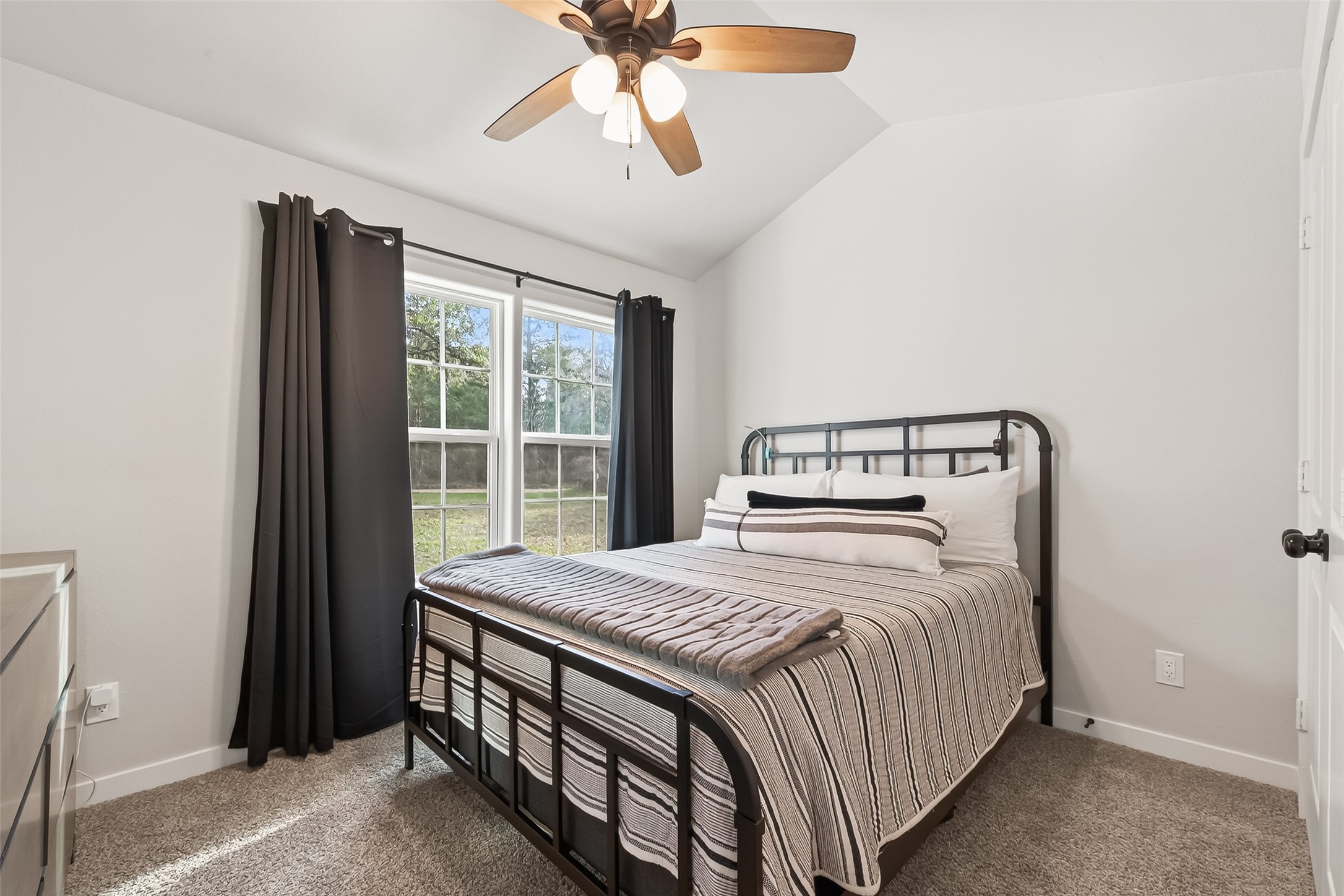 1047 Dungens Mill Road Columbus, TX 78934 - Photo 22 of 44 a bedroom with a bed and window