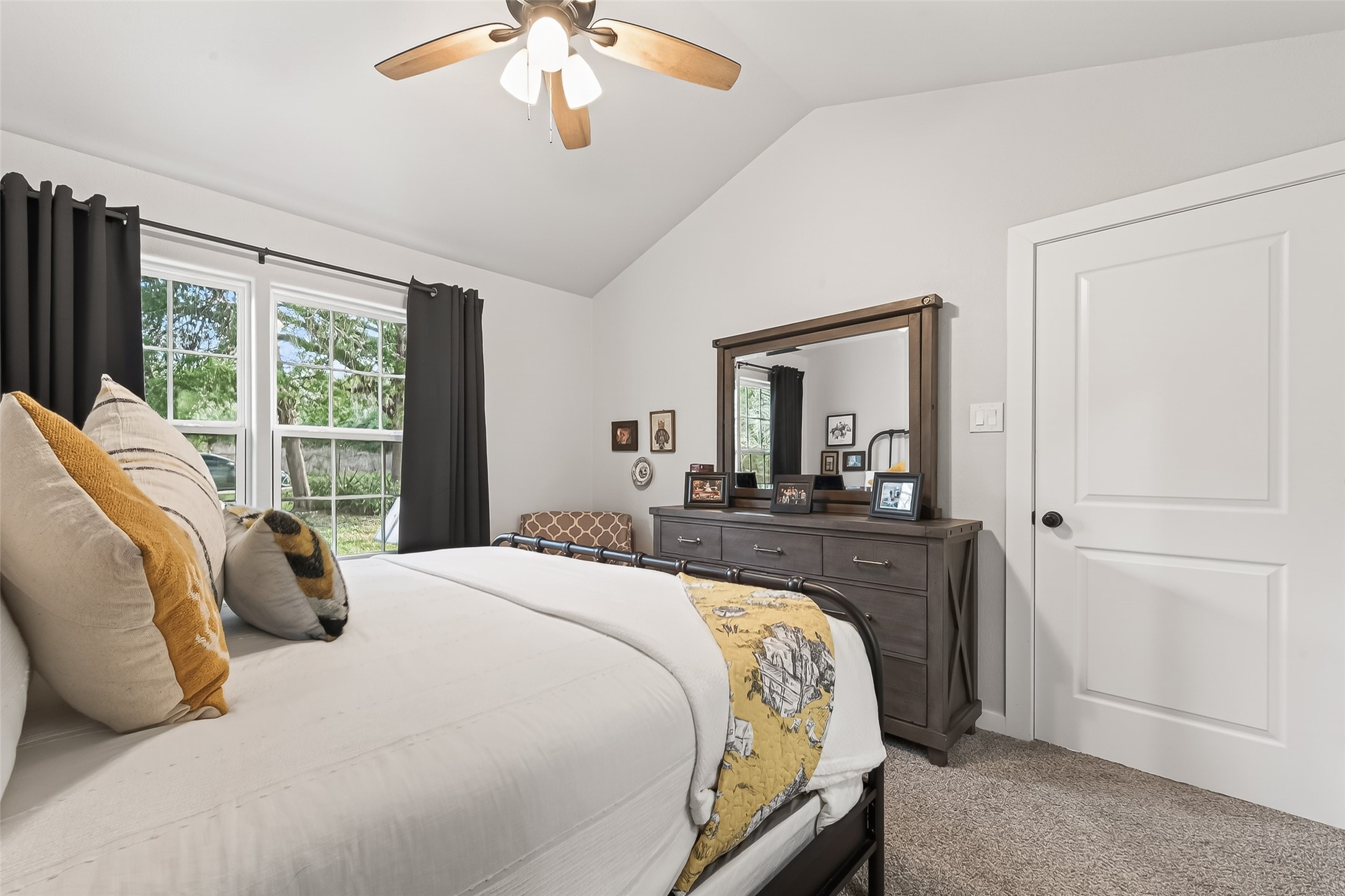 1047 Dungens Mill Road Columbus, TX 78934 - Photo 24 of 44 a bed sitting in a bedroom next to a window