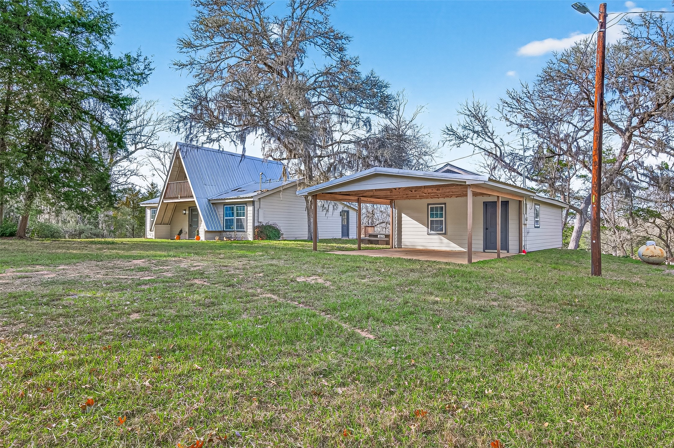 1047 Dungens Mill Road Columbus, TX 78934 - Photo 4 of 44 Fabulous 200 s.f. storage building or Bunk House. New Cabinet and Sink is in place. Plumbing can easily be added for a bathroom. Perfect for a workshop or convert to guest quarters.