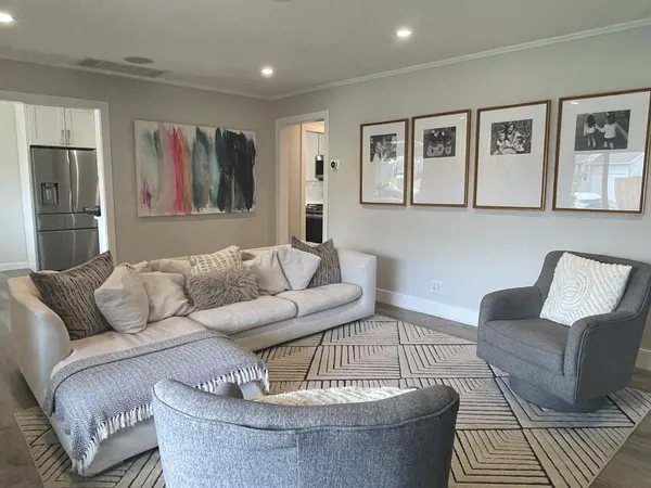 a living room with furniture and a couch