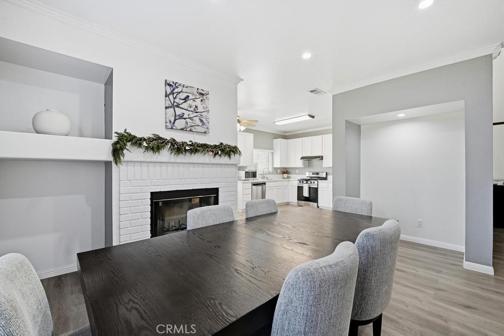 45664 Balmoral Court Lancaster, CA 93534 - Photo 15 of 38 a living room with furniture and a fireplace