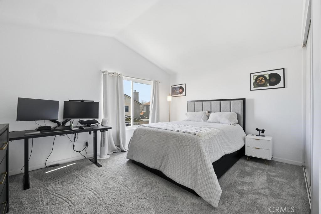 45664 Balmoral Court Lancaster, CA 93534 - Photo 25 of 38 a bedroom with a bed and computer on desk