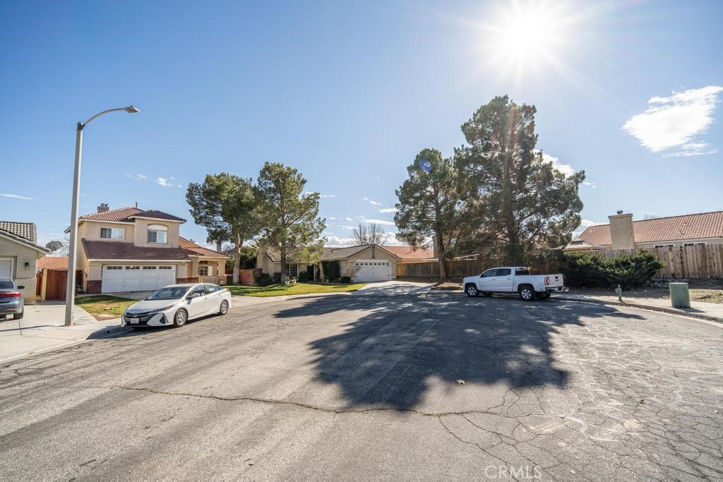 45664 Balmoral Court Lancaster, CA 93534 - Photo 35 of 38 a car parked on the side of the road