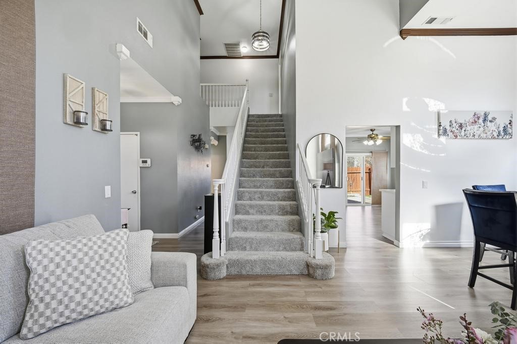 45664 Balmoral Court Lancaster, CA 93534 - Photo 10 of 38 a living room with furniture and wooden floor