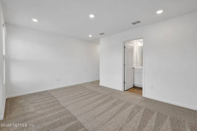 an empty room with an entryway