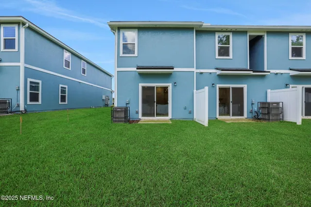 a view of a house with garden