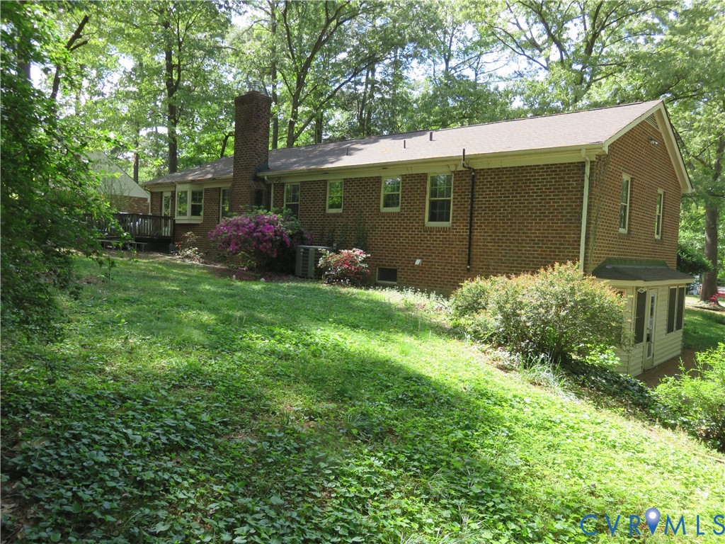 8379 Quailfield Road Mechanicsville, VA 23116 - Photo 8 of 56 a view of a back yard of the house
