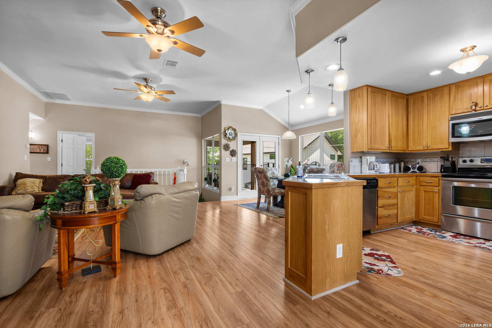 3900 Apache Circle Kingsland, TX 78639 - Photo 14 of 36 a living room kitchen with furniture and a kitchen view