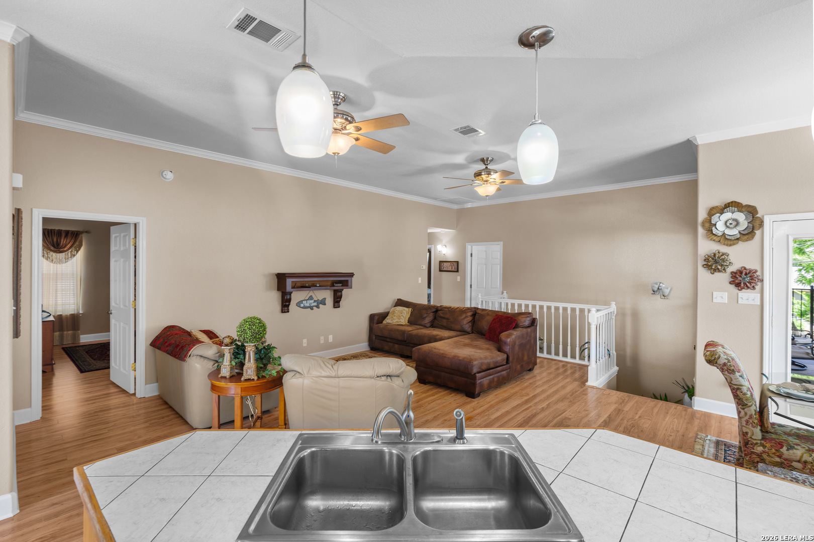 3900 Apache Circle Kingsland, TX 78639 - Photo 20 of 36 a living room with furniture and a chandelier