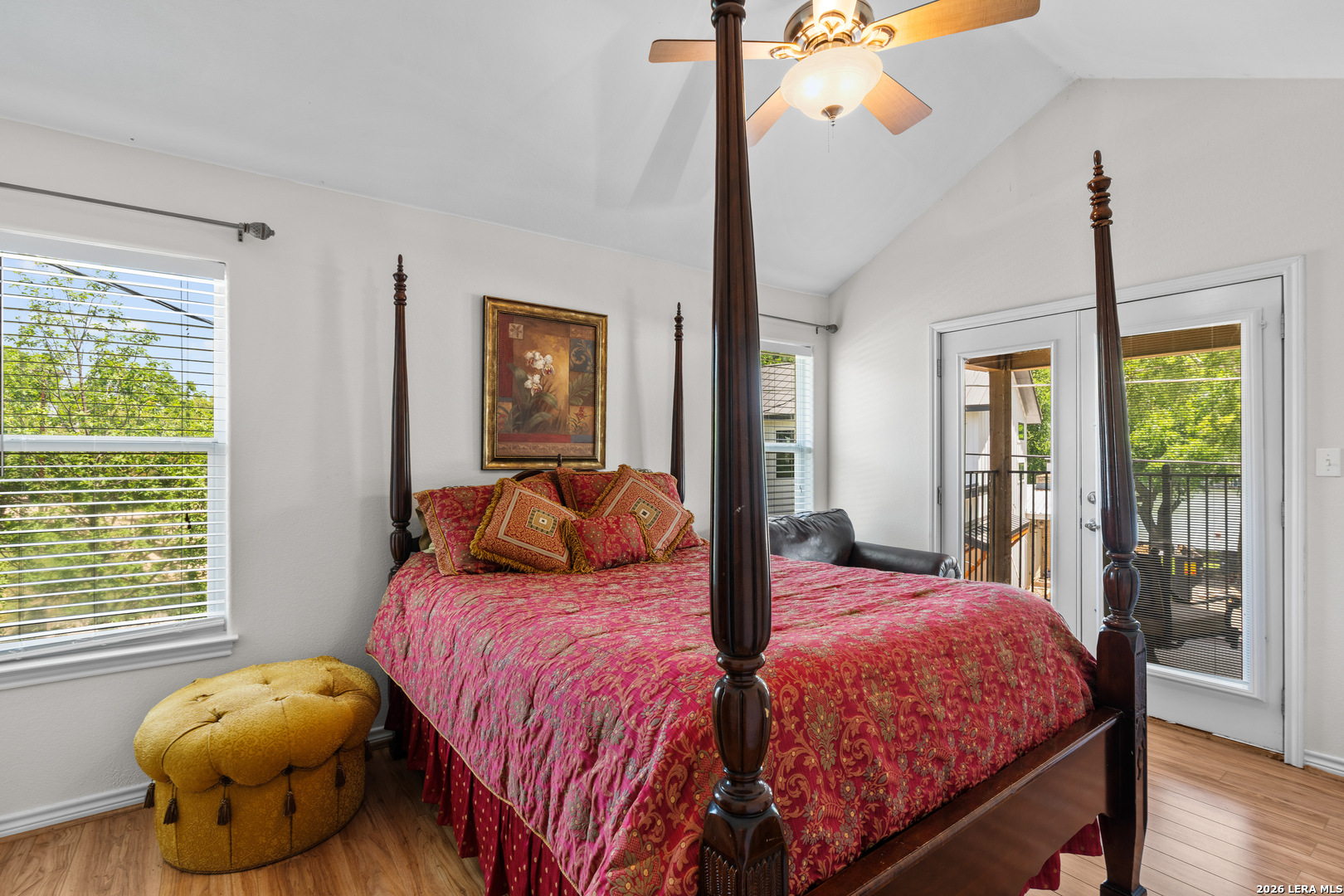 3900 Apache Circle Kingsland, TX 78639 - Photo 26 of 36 a bedroom with a large bed and a large window