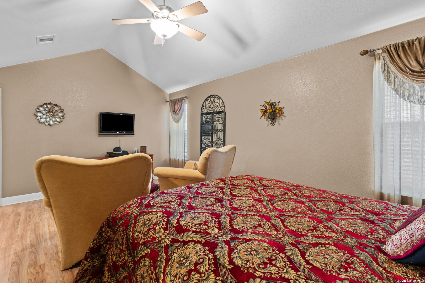 3900 Apache Circle Kingsland, TX 78639 - Photo 27 of 36 a bedroom with a bed and a flat screen tv