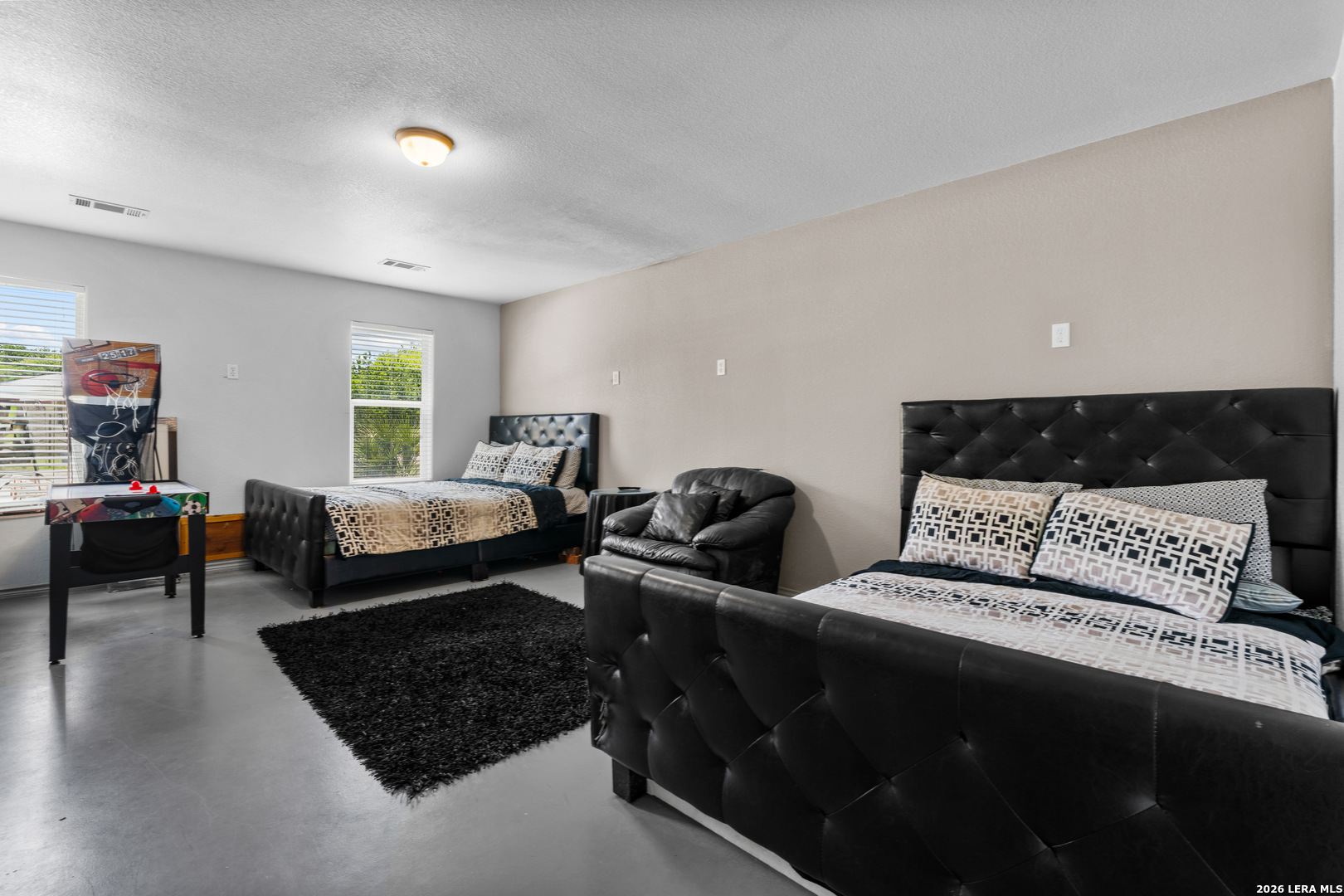 3900 Apache Circle Kingsland, TX 78639 - Photo 35 of 36 a bed room with two beds and a couch