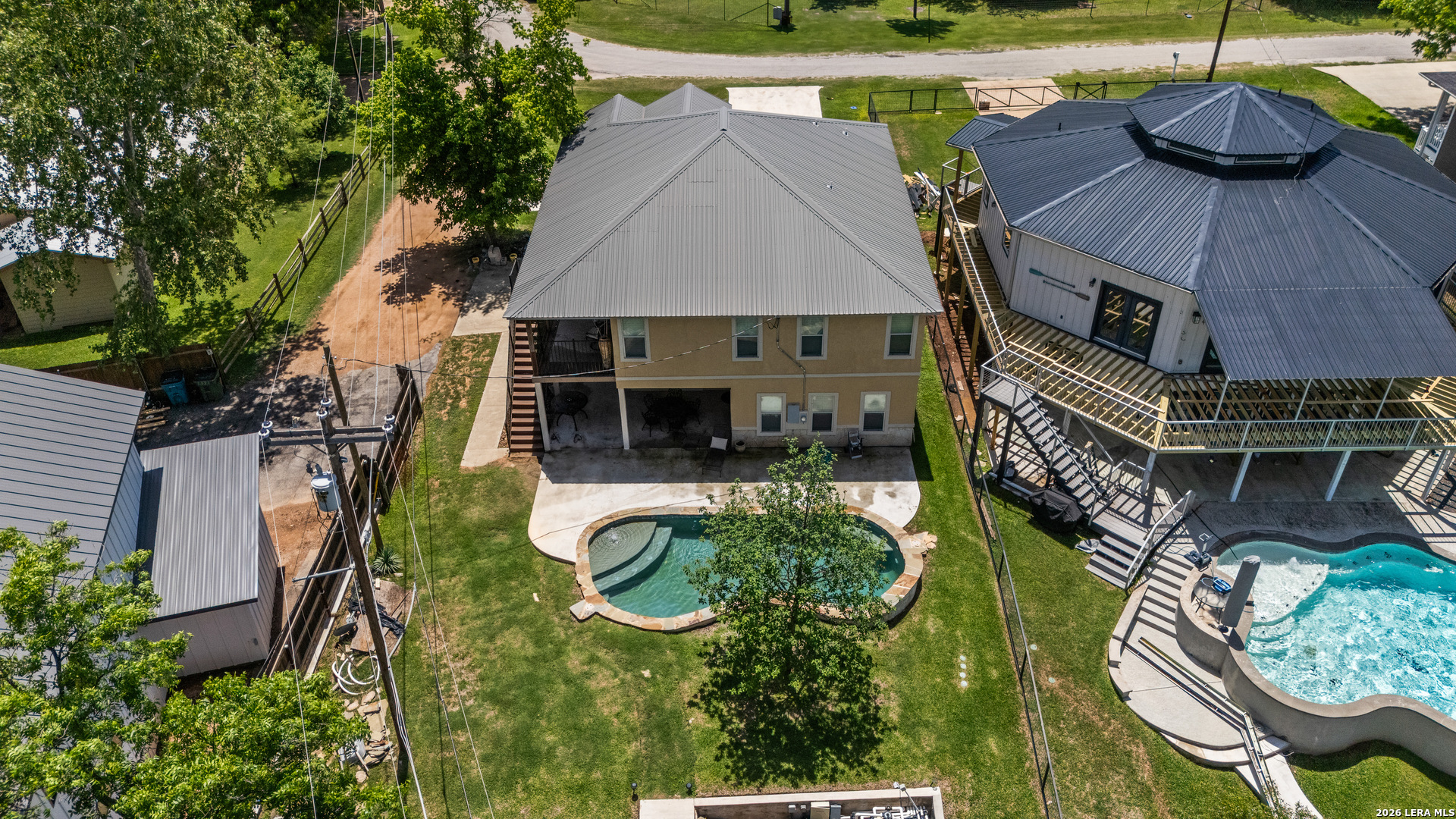 3900 Apache Circle Kingsland, TX 78639 - Photo 5 of 36 an aerial view of a house with swimming pool garden and outdoor seating