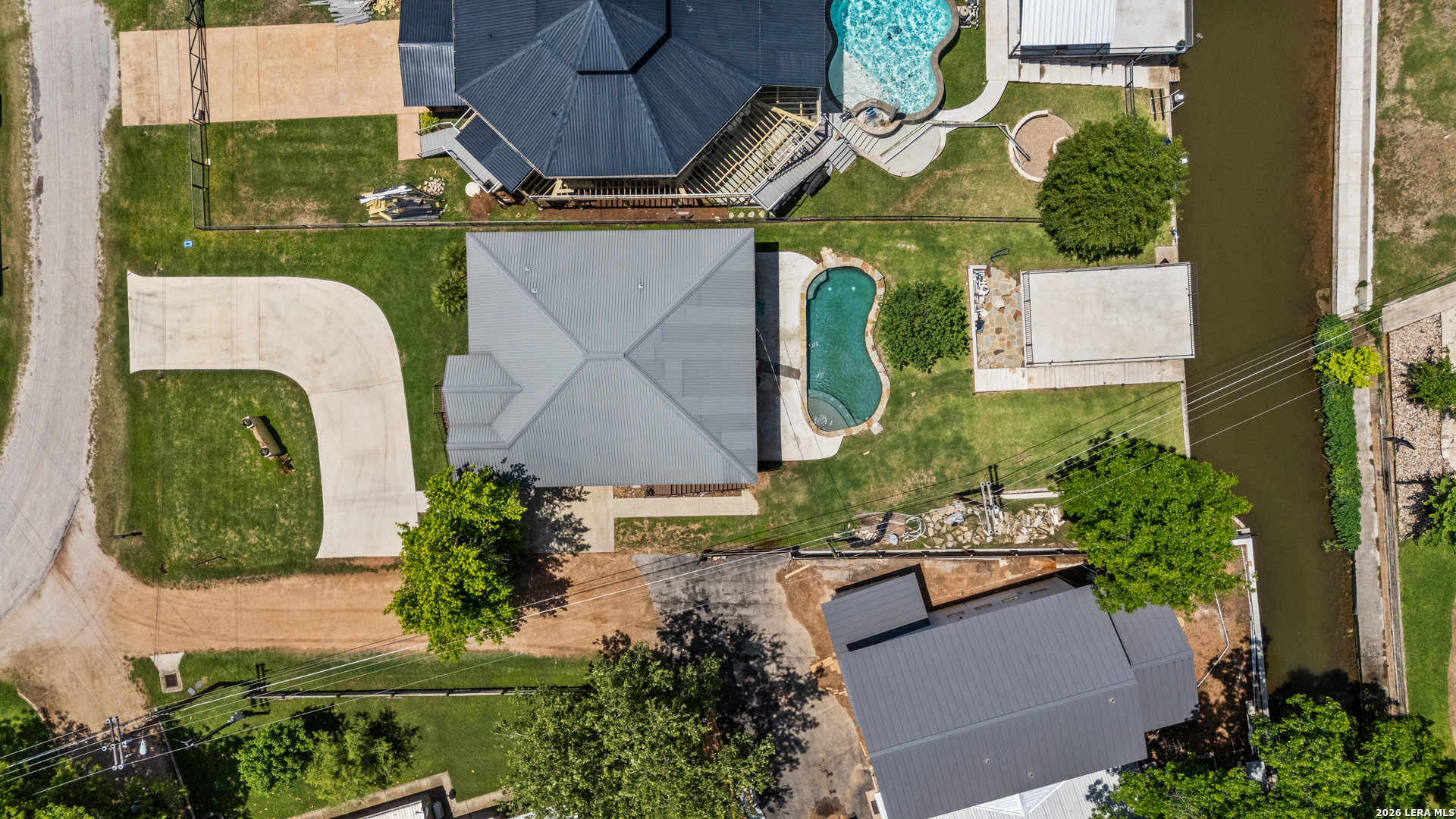 3900 Apache Circle Kingsland, TX 78639 - Photo 6 of 36 an aerial view of a fireplace with plants