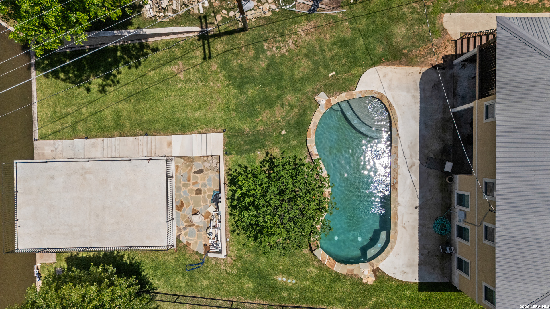 3900 Apache Circle Kingsland, TX 78639 - Photo 7 of 36 an aerial view of a swimming pool