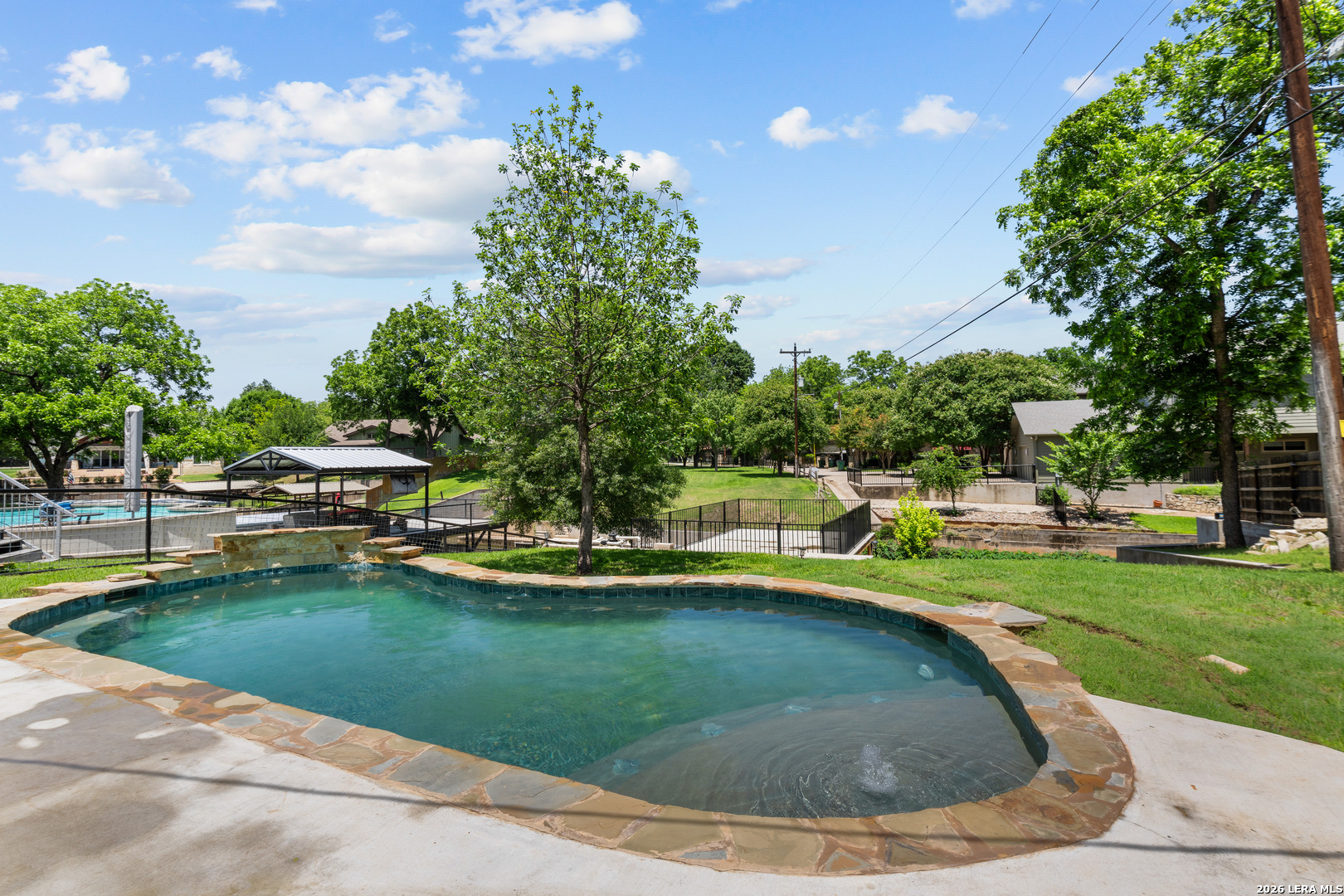 3900 Apache Circle Kingsland, TX 78639 - Photo 9 of 36 a view of a house with swimming pool and yard