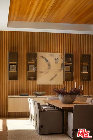 a room with table and chairs