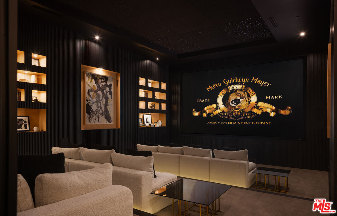 13187 Chalon Road Los Angeles, CA 90049 - Photo 27 of 39 a living room with furniture