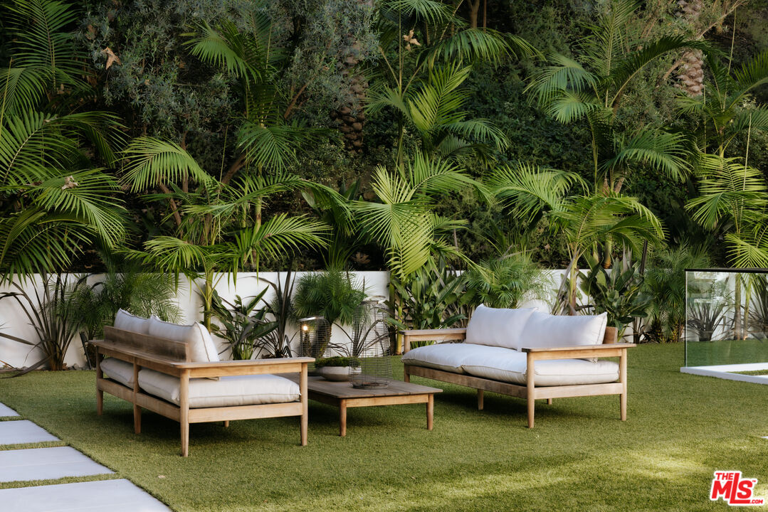 13187 Chalon Road Los Angeles, CA 90049 - Photo 30 of 39 a outdoor view with a sitting space