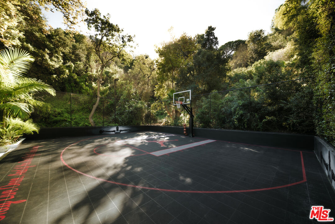 13187 Chalon Road Los Angeles, CA 90049 - Photo 33 of 39 a view of a tree in a yard