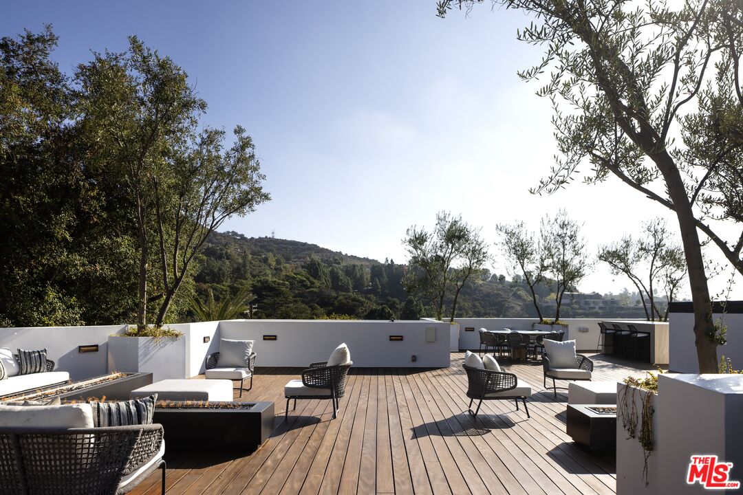 13187 Chalon Road Los Angeles, CA 90049 - Photo 35 of 39 a view of a patio on the roof deck