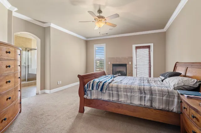 a bath tub sitting next to a bathroom sink