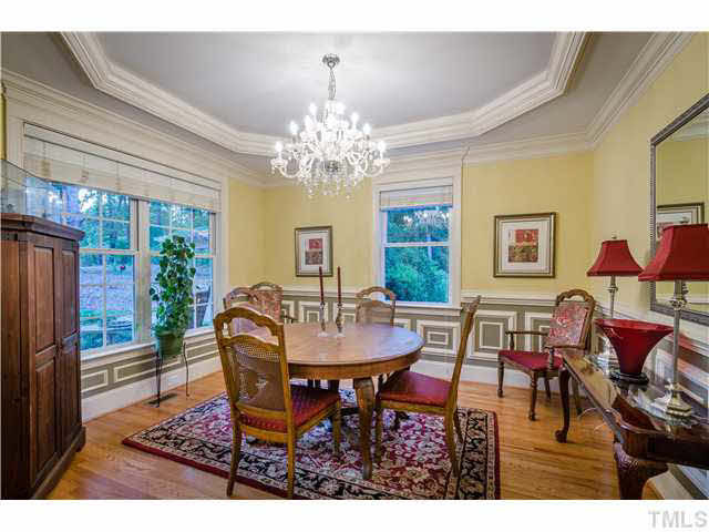 5120 Theys Road Raleigh, NC 27606 - Photo 4 of 25 Entertaining in this formal dining room will feel like dining in a five star restaurant. The windows and trim in this home are amazing! Dining Room