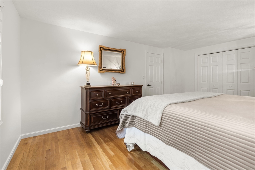 9 Andrews Farm Road Boxford, MA 01921 - Photo 31 of 36 a bedroom with a bed and a dresser