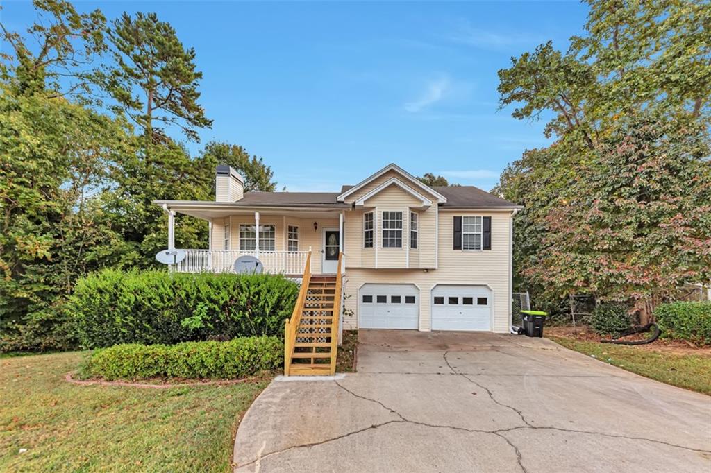 674 Fairview Drive Dallas, GA 30157 - Photo 1 of 1 a view of house with outdoor space and garden
