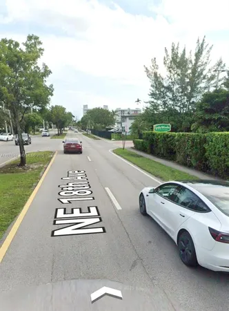 a car parked on the side of the river