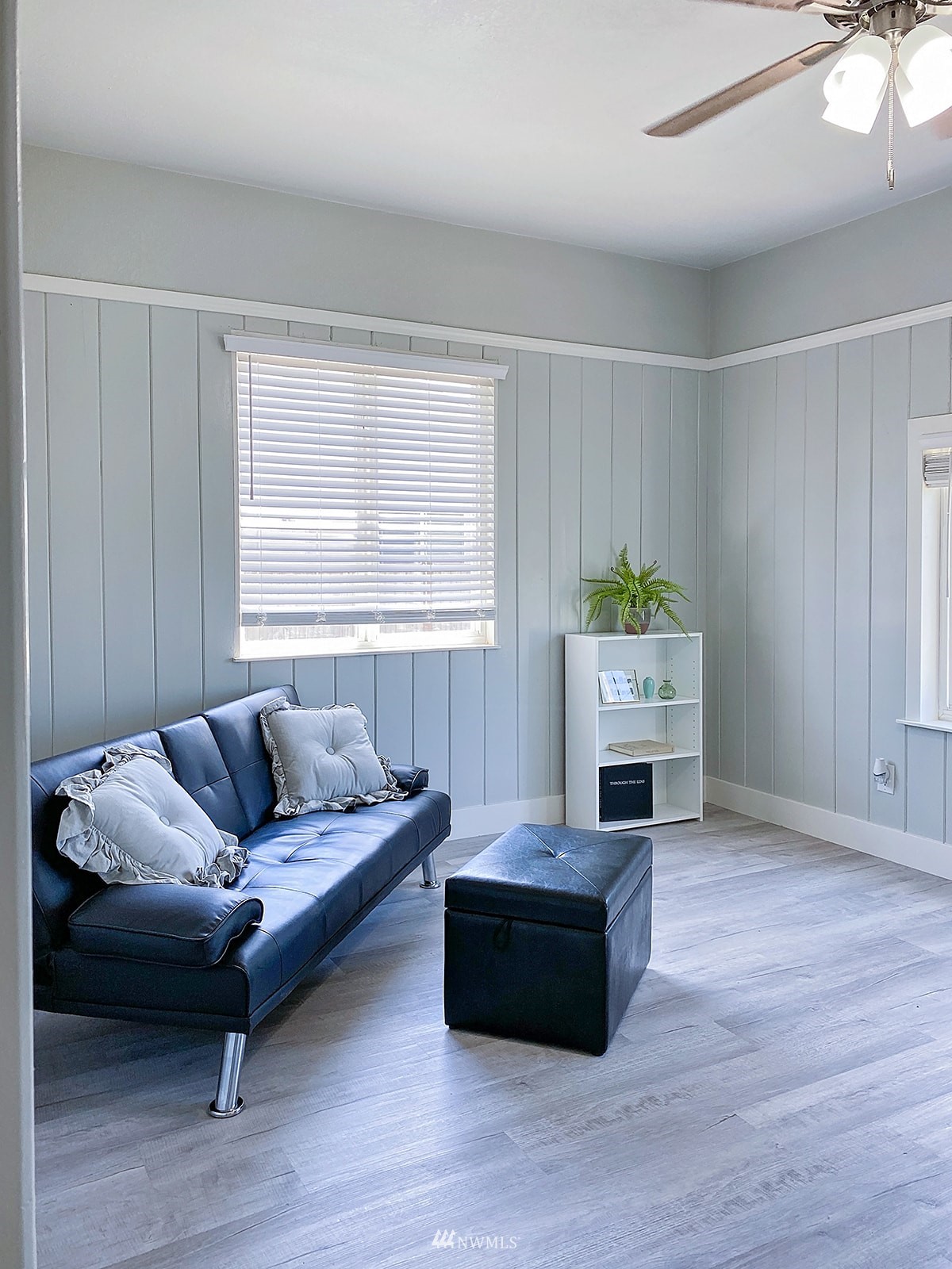 1005 9th Street Southwest Puyallup, WA 98371 - Photo 18 of 40 a living room with furniture and a fireplace