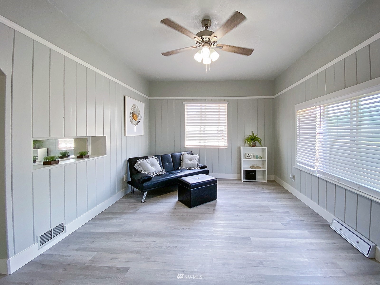 1005 9th Street Southwest Puyallup, WA 98371 - Photo 20 of 40 a living room with furniture and a wooden floor