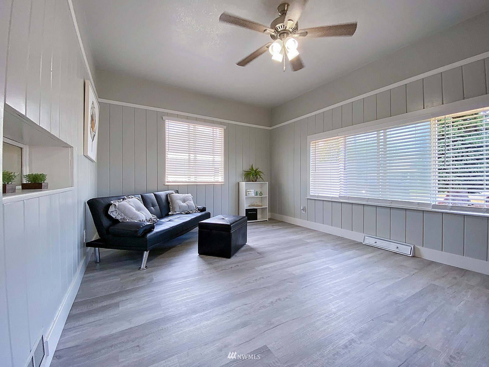 1005 9th Street Southwest Puyallup, WA 98371 - Photo 37 of 40 a living room with furniture and a large window