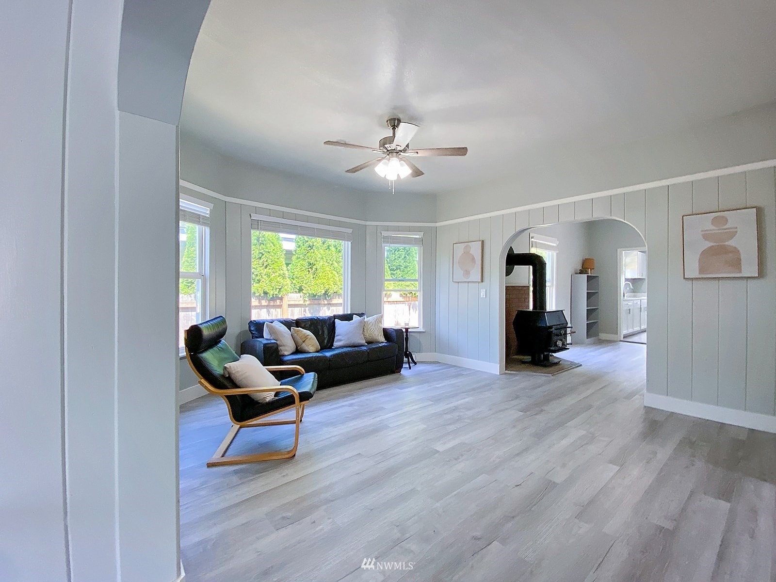 1005 9th Street Southwest Puyallup, WA 98371 - Photo 5 of 40 a living room with furniture and wooden floor