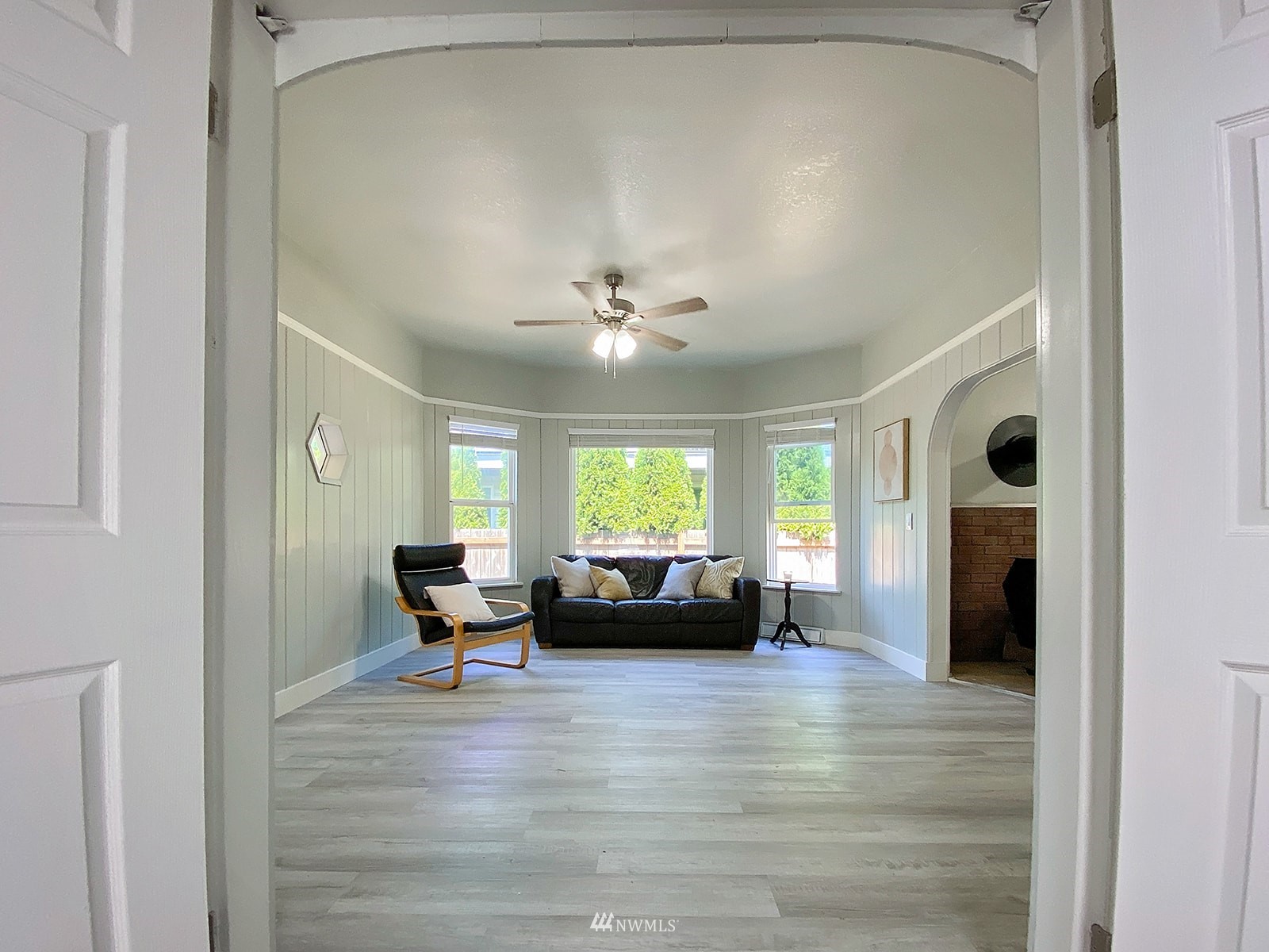 1005 9th Street Southwest Puyallup, WA 98371 - Photo 6 of 40 a living room with furniture and a large window