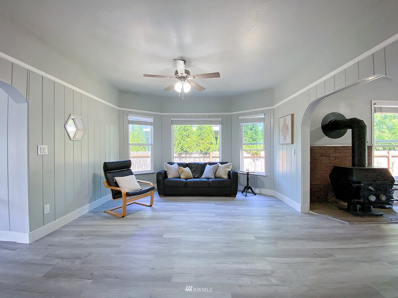 1005 9th Street Southwest Puyallup, WA 98371 - Photo 7 of 40 a living room with furniture and a fireplace