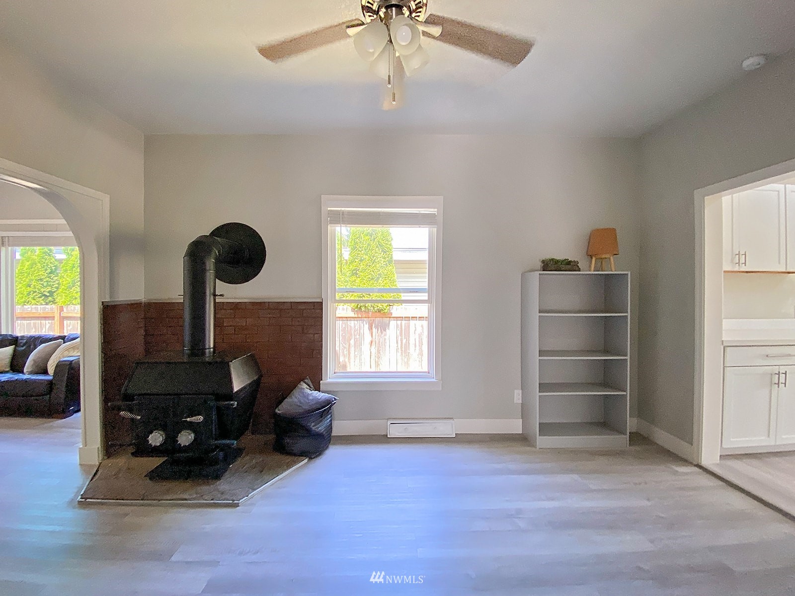 1005 9th Street Southwest Puyallup, WA 98371 - Photo 9 of 40 a living room with furniture and a fireplace