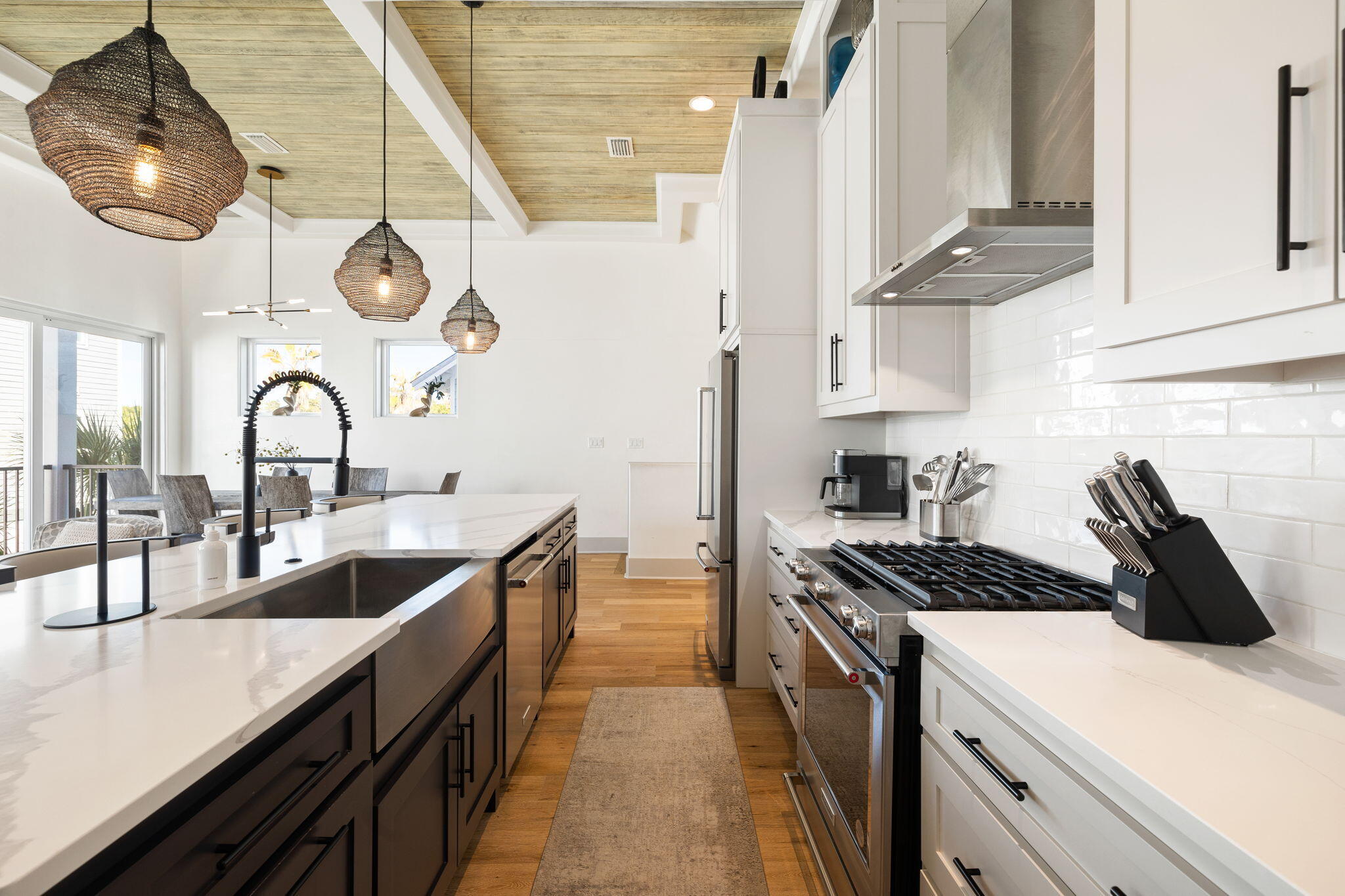 18 Inlet Heights Lane Inlet Beach, FL 32461 - Photo 21 of 46 a kitchen with stainless steel appliances a sink a stove and cabinets