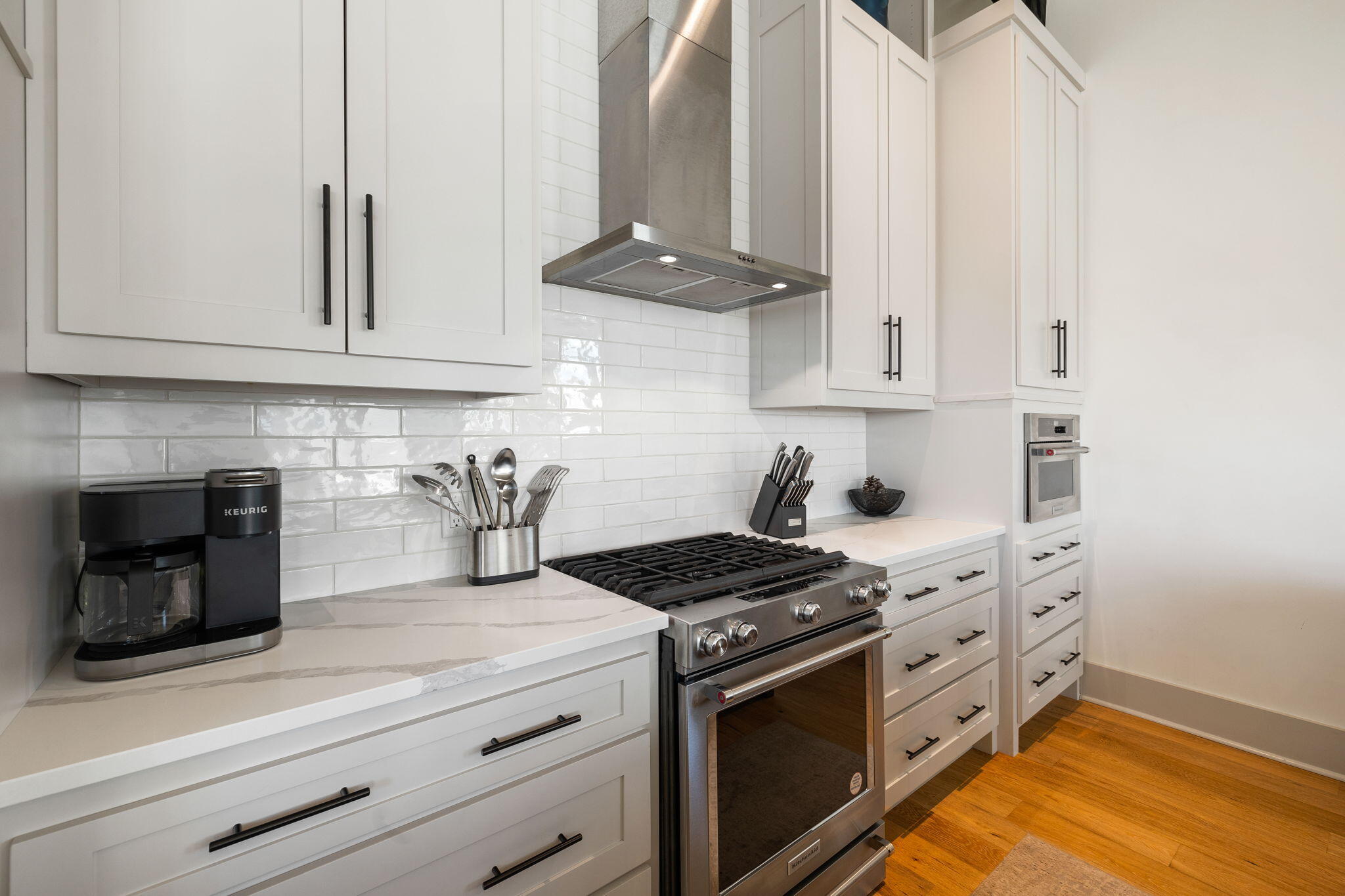 18 Inlet Heights Lane Inlet Beach, FL 32461 - Photo 22 of 46 a kitchen with granite countertop white cabinets and stainless steel appliances