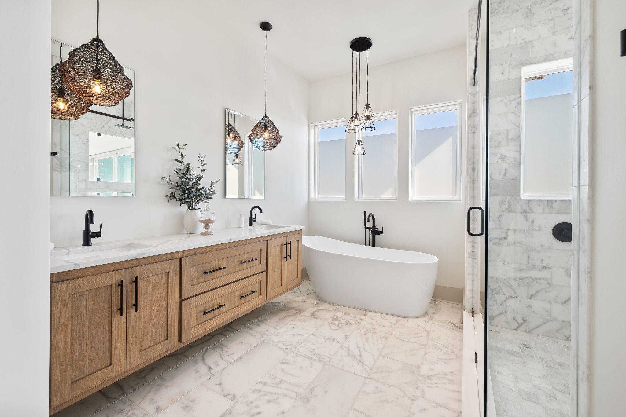 18 Inlet Heights Lane Inlet Beach, FL 32461 - Photo 39 of 46 a spacious bathroom with a double vanity sink a mirror and a bathtub