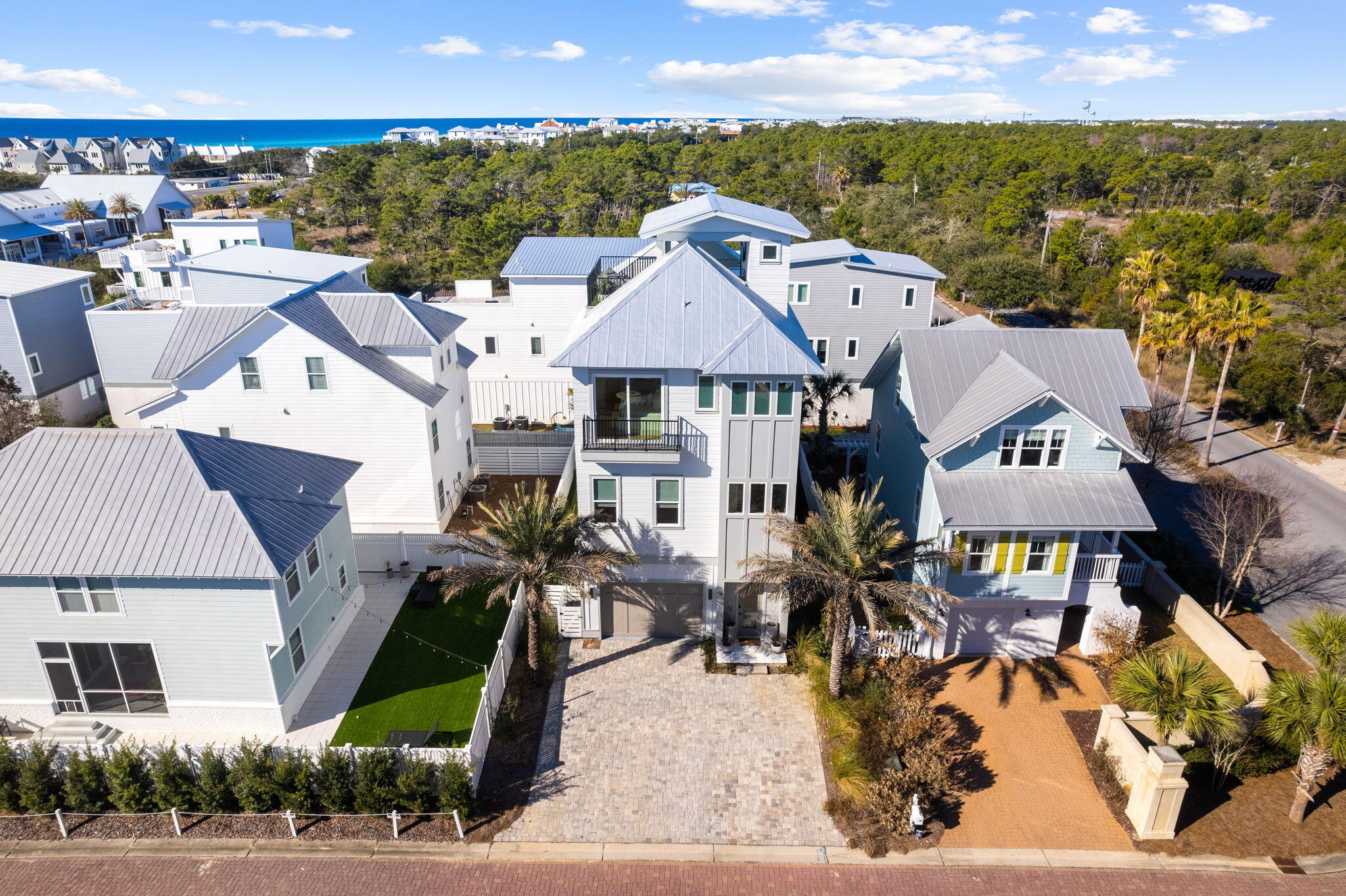 18 Inlet Heights Lane Inlet Beach, FL 32461 - Photo 46 of 46 an aerial view of multiple houses with a yard