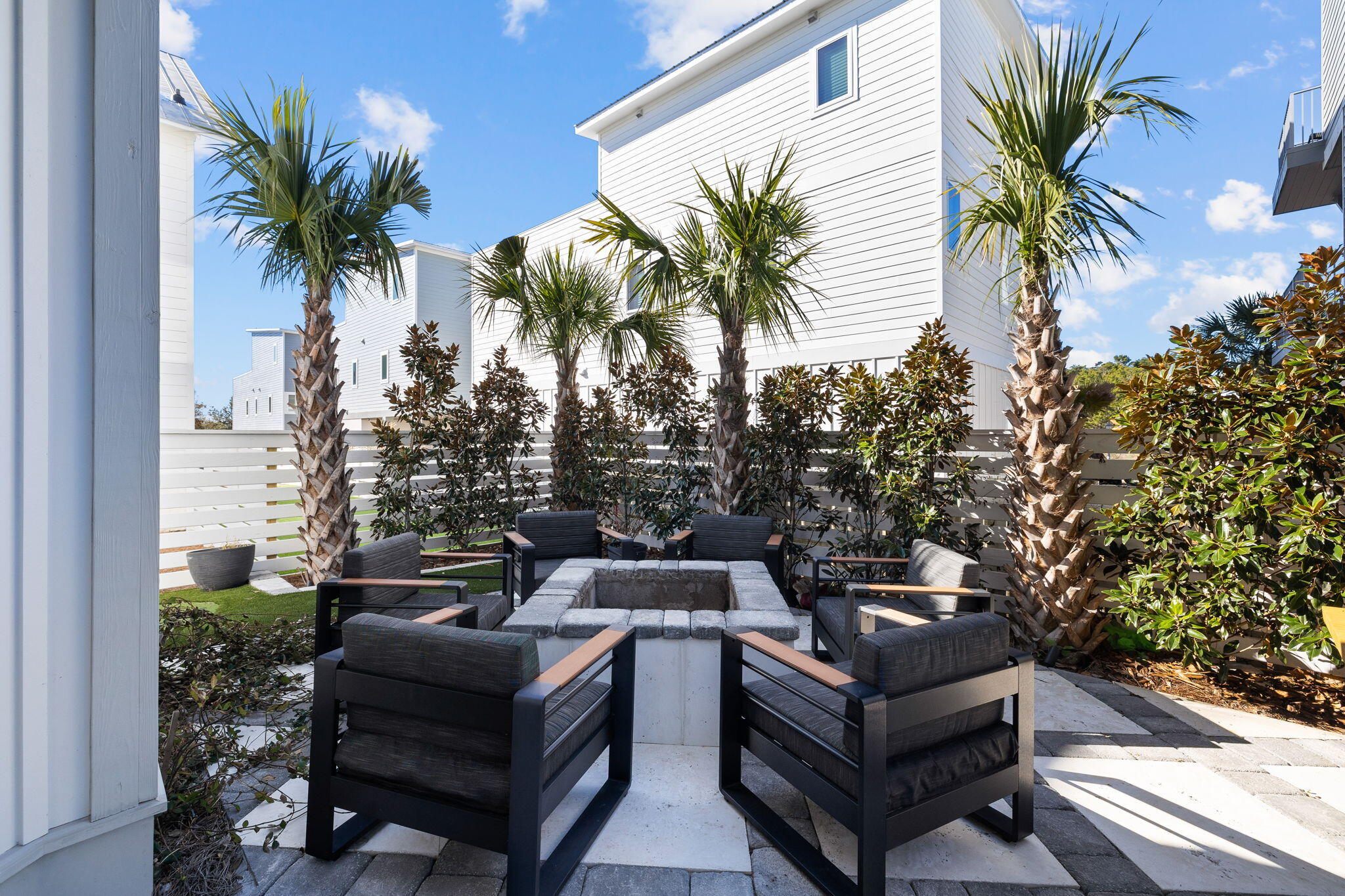 18 Inlet Heights Lane Inlet Beach, FL 32461 - Photo 10 of 46 a view of a patio with couches and a fire pit
