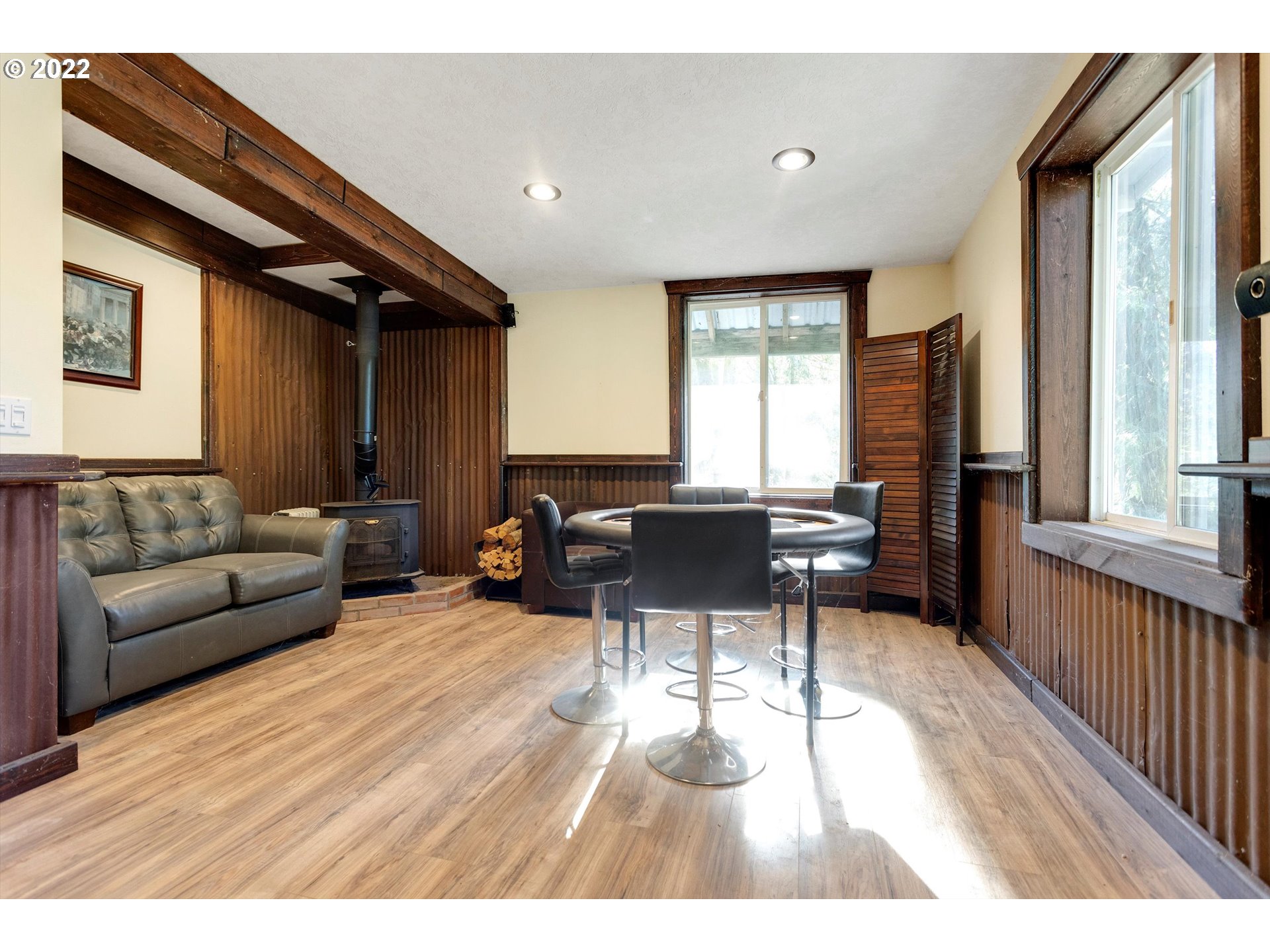 22543 South Central Point Road Oregon City, OR 97045 - Photo 19 of 32 a living room with furniture and a large window