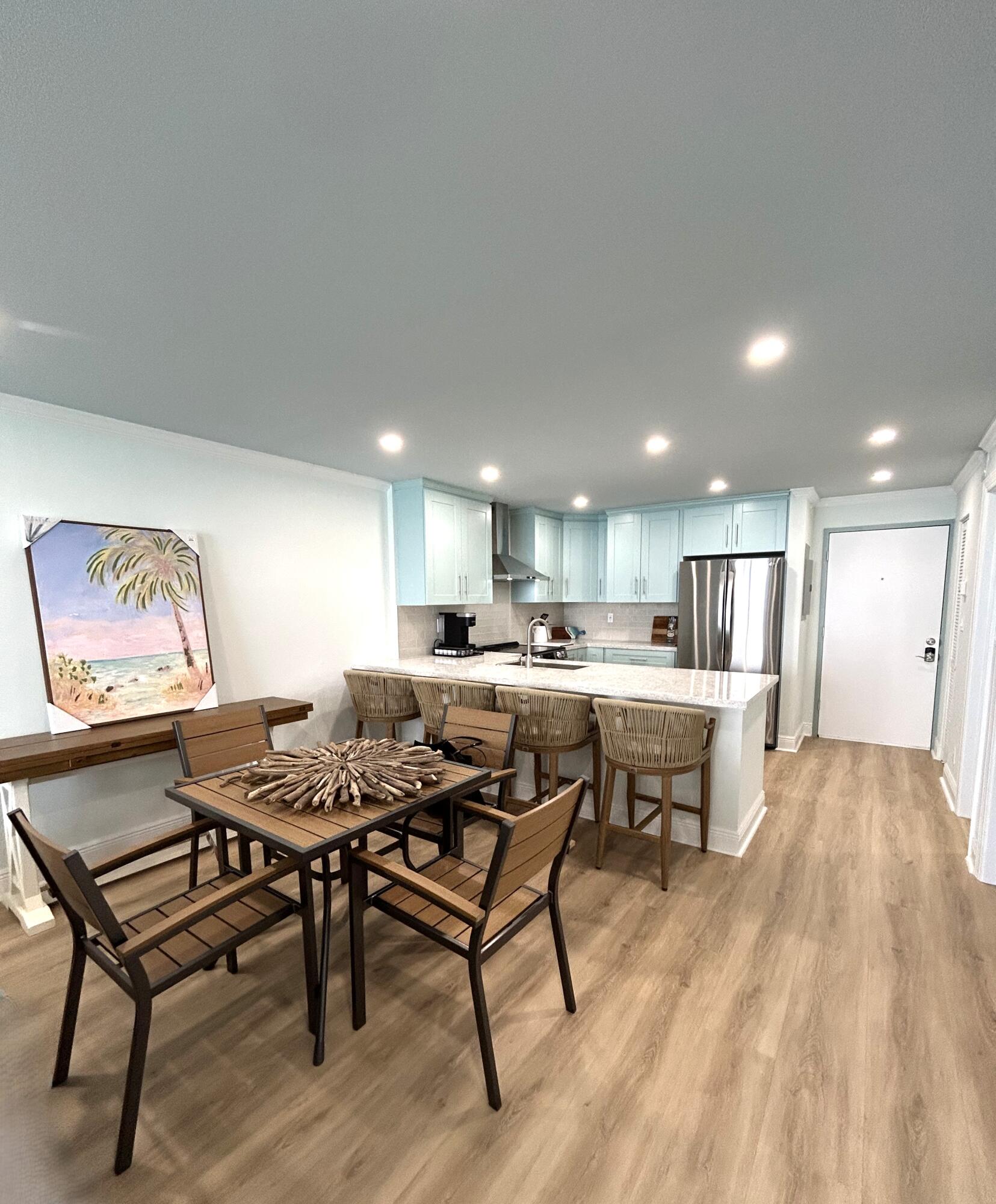 400 North Surf Road, Unit 1105 Hollywood, FL 33019 - Photo 3 of 15 a view of a dining room with furniture